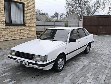 mini gps tracker: Toyota Camry: 1984 г., 2 л, Автомат, Бензин — 3