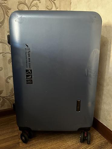 trolly bag: Чемодан на колёсах, цвет стальной синий. Особенности: - Прочный — 6