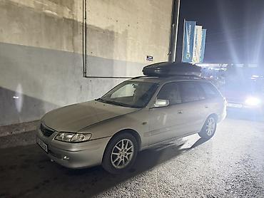 субару панель: Mazda 626: 2002 г., 2 л, Механика, Бензин, Универсал — 1