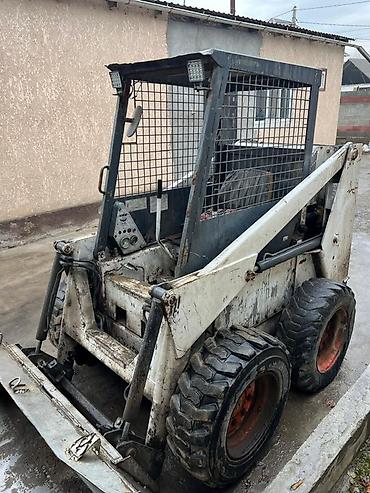 bobcat: Погрузчик, Колесный, Фронтальный — 1