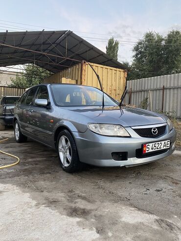 машина volkswagen: Mazda 323: 2002 г., 1.6 л, Механика, Бензин, Хэтчбэк