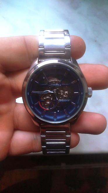muncuq qolbaqlar: Tommy Hilfiger mexaniki (automatic) kişi qol saatı - Korpus və kəmər — 2