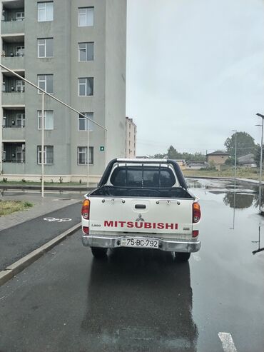 Mitsubishi: Mitsubishi pikap – ikiqat kabinəli, arxa açıq yük bölməsi və — 7