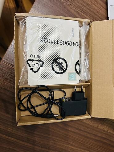 simli mikrofon: Huawei simli router/ONT cihazı Xüsusiyyətlər: - Brend: Huawei - Tip — 1
