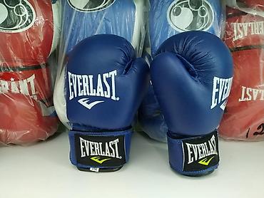 Перчатки: Детские боксерские перчатки everlast 2 размера в спортивном магазине — 1
