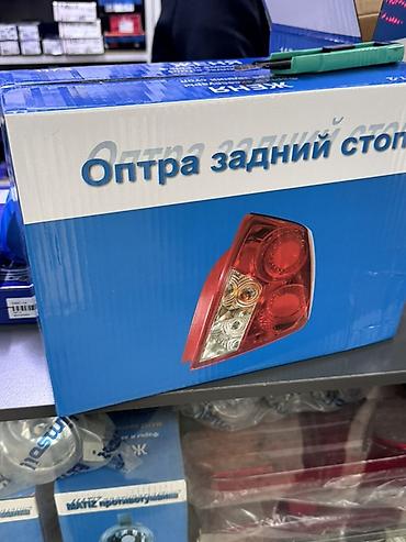 запчасти опель вектра б: Задний правый стоп-сигнал Chevrolet Новый, Аналог — 1