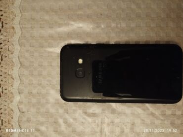 bərdə telefon: Samsung Galaxy A3 2017, 16 GB, rəng - Qara, İki sim kartlı