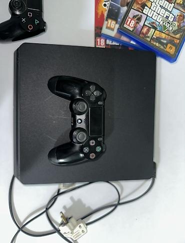Sony PlayStation: PlayStation 4 Slim (черная) Комплектация: - консоль PS4 Slim - 2 — 1
