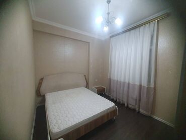 Uzunmüddətli kirayə mənzillər: Yasamal Midada Yeni tikilmiş 9 mərtəbəli binanın 1-ci mərtəbəsində 2 — 3