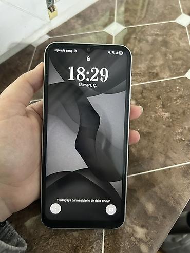 ipad 10.2 qiymeti: Samsung Galaxy A14, rəng - Gümüşü, Barmaq izi — 1