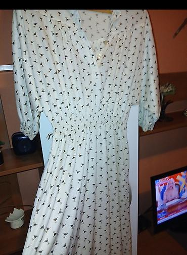 Donji deo: Ženske trenerke i haljina – set različitih komada 1) Crne sportske — 4