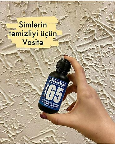 gitara aksesuar: Dunlop markasına məxsus simlərin təmizliyi üçün vasitə. Ünvan:Nizami — 1