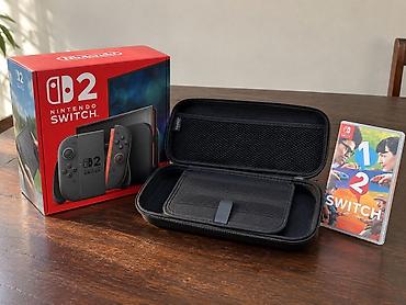 switch 2: Nintendo Switch 2 + keysi + Switch 1/2 oyun diski Hamısı birlikde - — 1