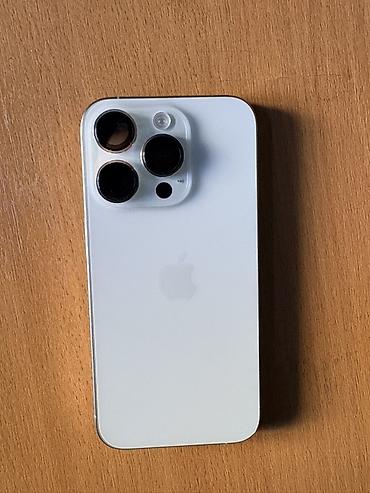 Уюлдук телефондор жана аксессуарлар: IPhone 15 Pro, Колдонулган, 128 ГБ, White Titanium, Коргоочу айнек, 88 % — 2