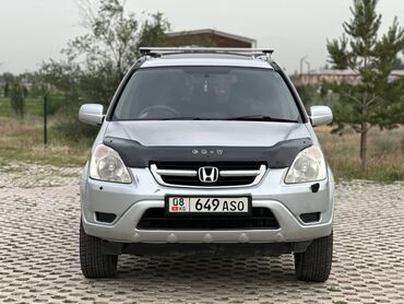 Honda: Предлагается к продаже серебристый внедорожник Honda CR-V. Объем