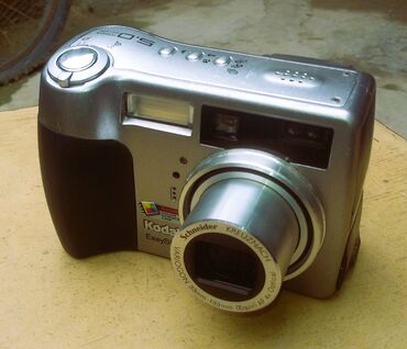 fotoaparat satilir: Məhsulun adı: Kodak EasyShare Z720. Qoşulma tipi: E-mail paylaşma