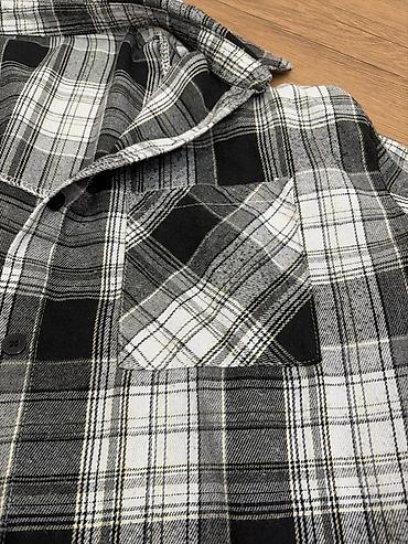 Kişi geyimləri: Qara‑ağ‑boz rəng palitrasında dama (plaid) naxışlı flanel köynək. - — 4