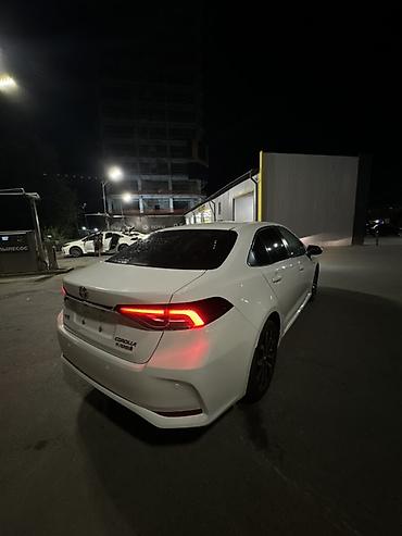 byd e1: Toyota Corolla: 2022 г., 1.8 л, Автомат, Гибрид, Седан — 10