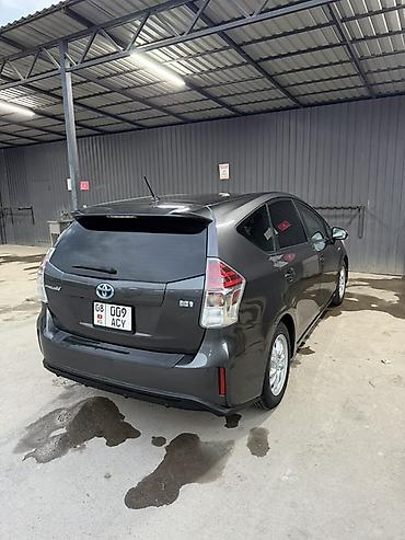 королла 1 6: Toyota Prius V: 2016 г., 1.8 л, Автомат, Гибрид, Универсал — 2