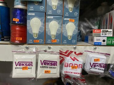 электрические лампы: LED-лампы и электроустановочные изделия Ассортимент на фото: -