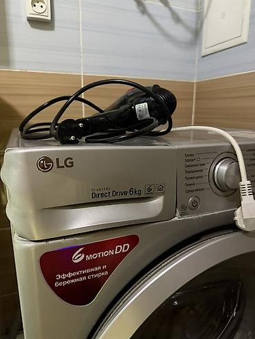 diagnosis: Стиральная машина LG с фронтальной загрузкой, серебристый корпус — 3