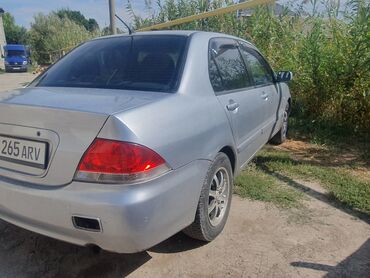 обмен на дайхатсу: Mitsubishi Lancer: 2005 г., 1.6 л, Автомат, Бензин, Седан