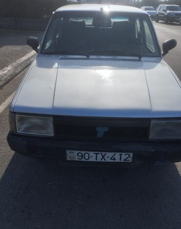 Tofas: Tofaş Şahin/Doğan (sedan) – gümüşü rəng Xüsusiyyətlər: - Kuzov: 4 — 5