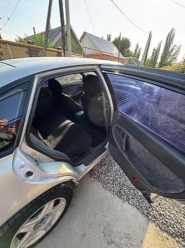 fix jixf: Mazda 626: 1993 г., 2.5 л, Механика, Бензин, Седан — 8