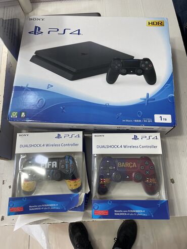 ps4 slim 1 tb: Ps4 slim satilir 1 TB yaddas 2 pult ustunde hediyye verilir acilmiyib