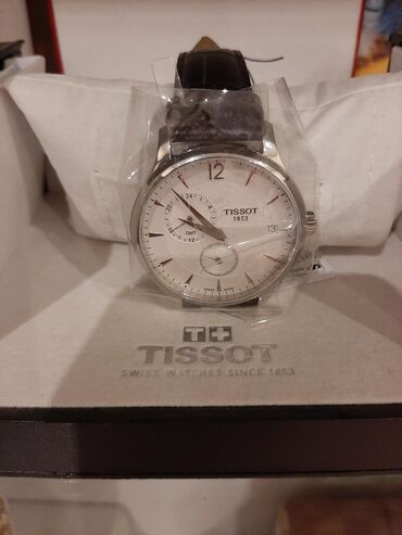 Наручные часы: Продаётся часы швейцарской марки TISSOT.При создании этих часов были