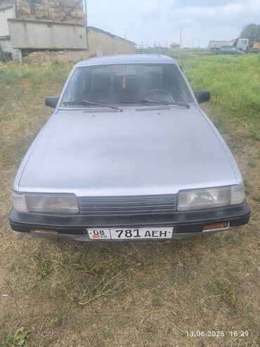 купить верблюжье одеяло: Mazda 626: 1988 г., Механика, Бензин, Седан
