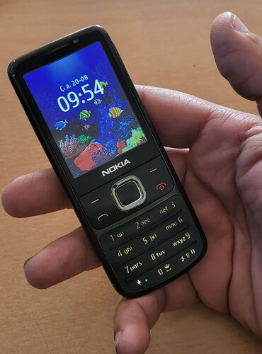 nokia 1100 qiymeti: Nokia 6700 Slide, rəng - Qara, Düyməli