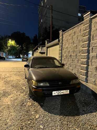 купить новый мотоцикл в бишкеке: Автомобиль Toyota Corolla в кузове седан, отличающийся классическим