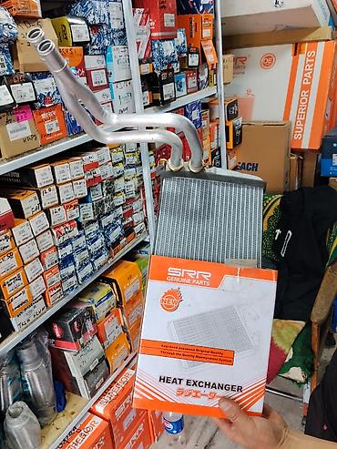 Теплообменник (радиатор отопителя) SRR Genuine Parts - Назначение
