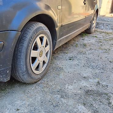 matoru vurub: Volkswagen Passat: 1.6 l | 1999 il Sedan — 3
