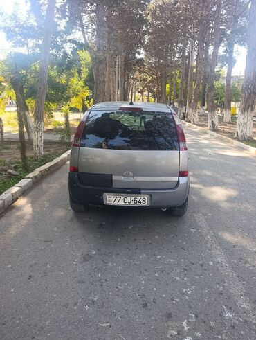 Opel: Opel Meriva, gümüşü rəngli, 5 qapılı kompakt minivan. Xüsusiyyətlər — 6