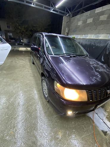 обмен сапок: Nissan Bassara: 1999 г., 2 л, Автомат, Бензин, Универсал — 5