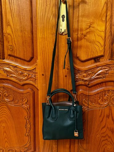 Polo köynəklər: Michael Kors 
Mini ölçü,yaşıl rəng
50 azn