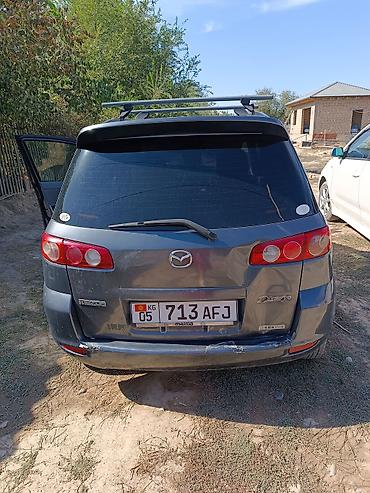 урус машина: Mazda Verisa: 2003 г., 1.3 л, Кол менен иштөөчү, Бензин, Хетчбек — 8