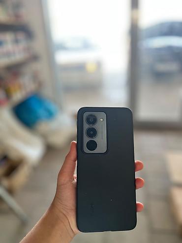 телефон fly f: Xiaomi 15, 128 ГБ, цвет - Черный, 
 Сенсорный, Отпечаток пальца, Face ID — 2