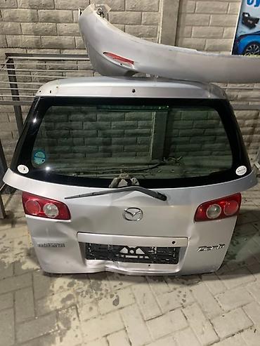Крышки багажника и комплектующие: Крышка багажника Mazda — 1