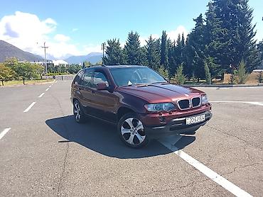 te 28 traktor satisi: BMW X5 (E53), bordoya çalan tünd qırmızı rəngdə SUV. Texniki və — 1