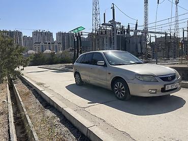 ротационная борона: Mazda 323: 2001 г., 1.6 л, Механика, Бензин, Универсал — 2