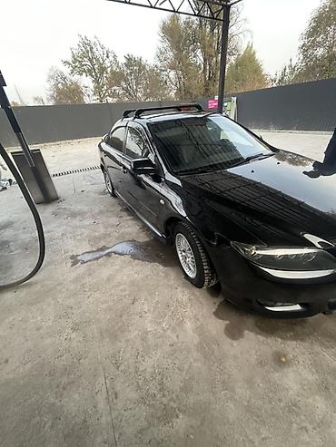 мицубиси спес стар: Mazda 6: 2001 г., 2 л, Механика, Газ, Седан — 4