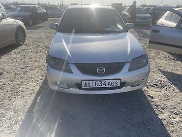 Mazda Familia: 2001 г., 2 л, Автомат, Бензин, Универсал