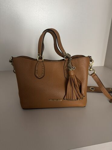 Michael Kors, Б/у