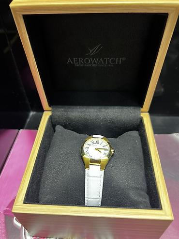geneva platinum: Aerowatch — швейцарские наручные часы - Корпус: сталь с золотистым — 4
