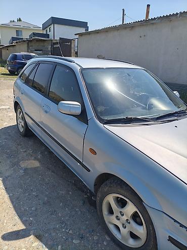 Транспорт: Mazda 323: 2000 г., 1.5 л, Механика, Бензин, Универсал — 2