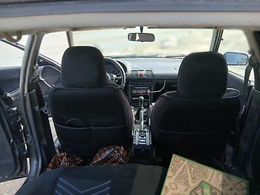 для такси авто: Mazda 323: 1991 г., 1.6 л, Механика, Бензин, Лифтбек — 5