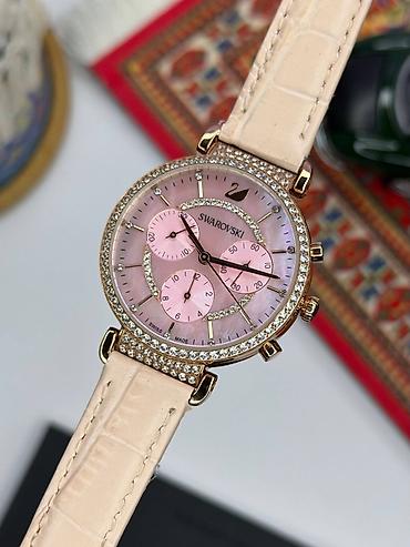 saat omega: Swarovski qadın qol saatı – roze qızılı tonlarda, zərif kristal — 8